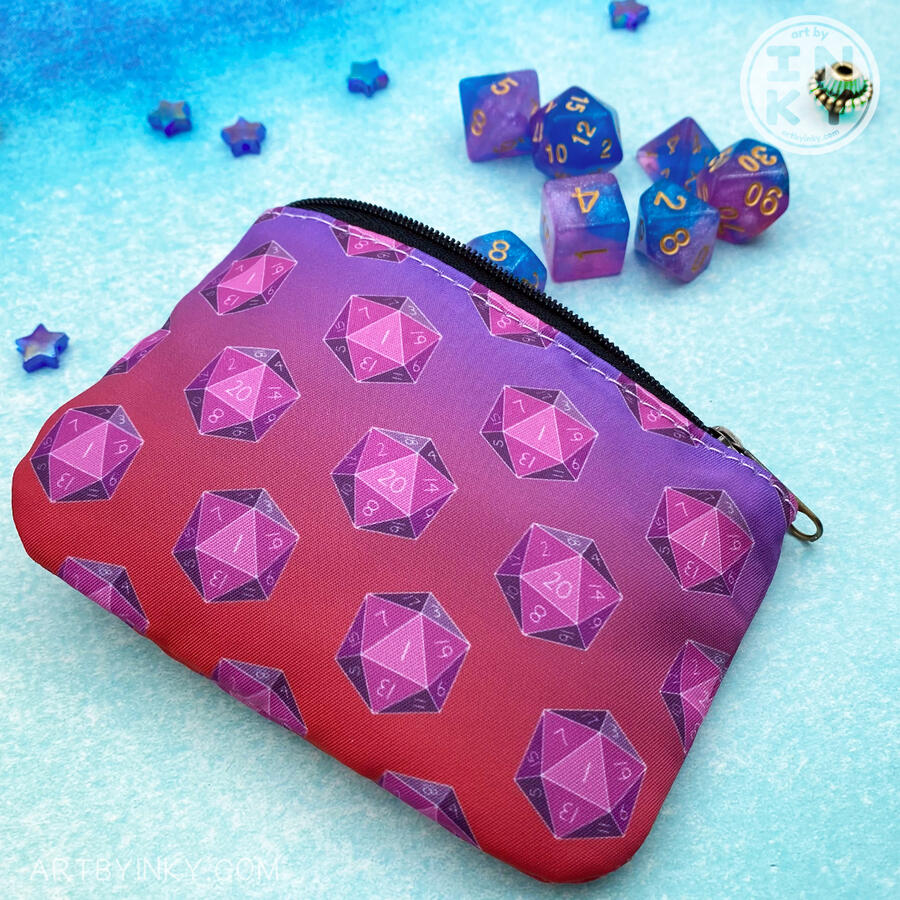 Dice Coin Purse A purple and pink 20-sided dice coin purse on a blue background with dice spilling out of it.